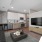 a living room with a couch and a tv
