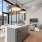 a preps island next to a living room