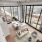 a living room with oversized windows