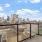 a view of a city from a balcony