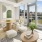 open concept living room and dining area surrounded by picture windows offering fantastic city views