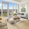 dining area and living room with floor-to-ceiling windows